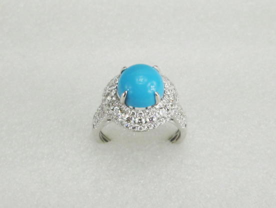 18 K White Gold Ring With real diamond and turquoise stone